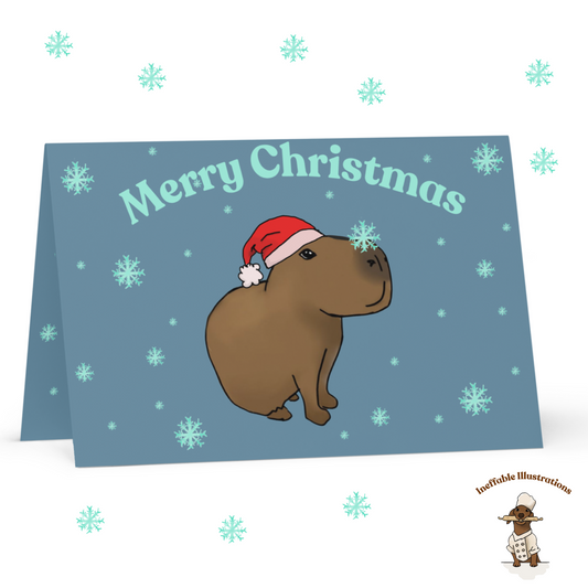 Capybara Christmas Greeting Card | Capybara Jolly Playing with Snowflakes | Cute Holiday Card for Winter Greetings