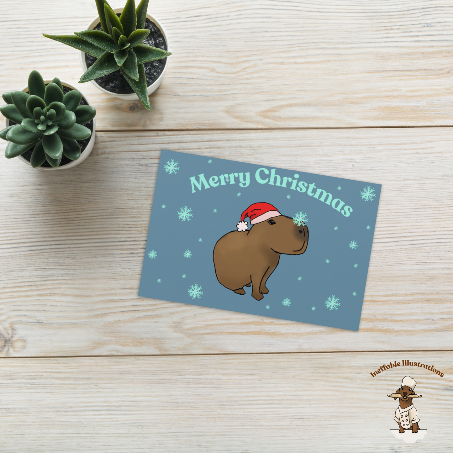 Capybara Christmas Greeting Card | Capybara Jolly Playing with Snowflakes | Cute Holiday Card for Winter Greetings